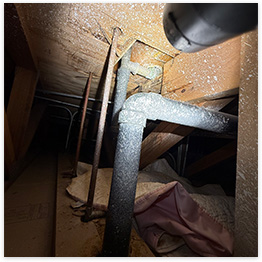 An image taken by an employee of Stack Service Plumbing of plumbing work in the crawl space of a home
